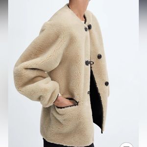 MANGO Fur-effect coat with appliqués